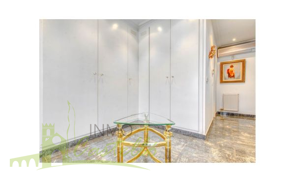 Dormitorio suite con vestidor