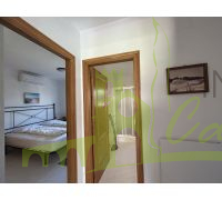 Pasillo a los dormitorios y baño
