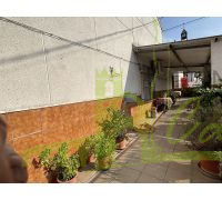 Fachada lateral y patio