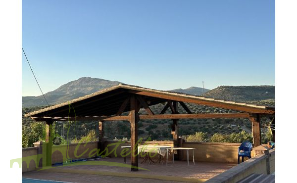 Terraza con porche de madera